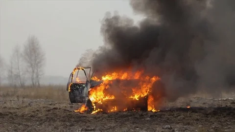 Car On Fire, Burning Car In The Field, Front View Stock Footage 101532254