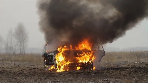Car On Fire, Burning Car In The Field, Front View Stock Footage 101532534