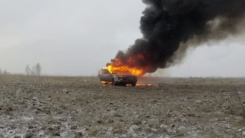 Car On Fire, Burning Car In The Field Stock Footage 101532723