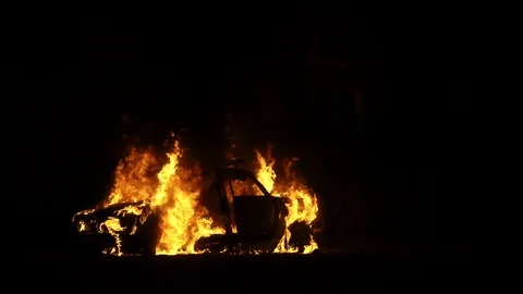 Car on fire burning orange flames, slow-motion shooting Stock Footage 115269471