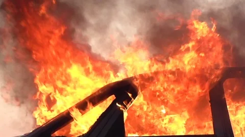 Car on fire outside Video stock 73022611