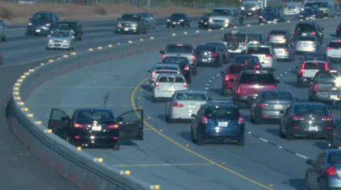 Car with Flashers on Parked on Freeway In Rush Hour Traffic Stock Footage 53863385