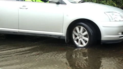 Car in flooded road Stock Footage 44639797
