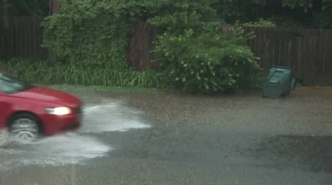 Car on flooded street Stock Footage 7746271