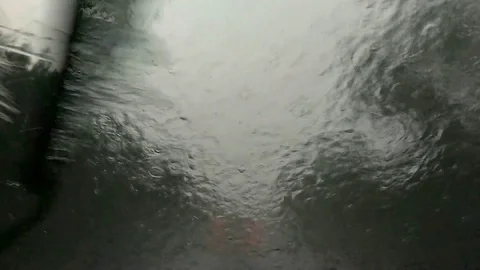 Car flooding during a thunderstorm Stock Footage 115050492