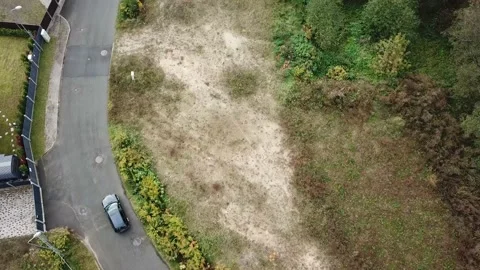 Car follow through small road Stock Footage 164560258