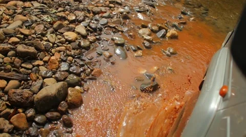 Car forcing river Stock Footage 56482491