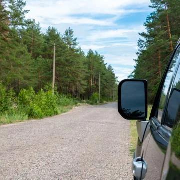 Car in the forest road Stock Photos