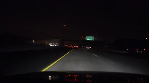 Car on a freeway at night Stock Footage 45276925