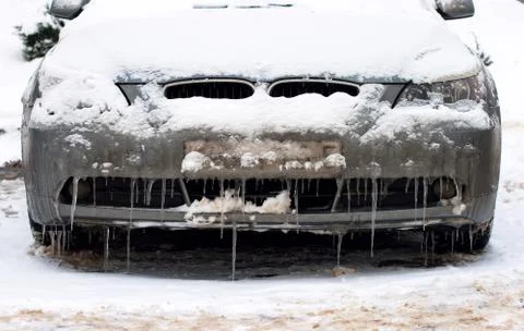 Car in front, covered with icicles Stock Photos