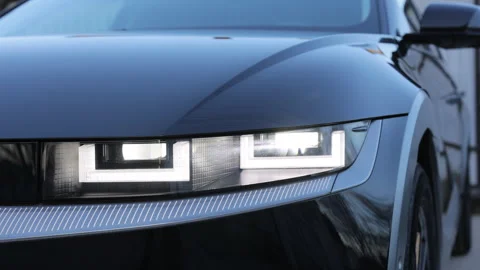 Car Front Full Led Light. Switched on led lights of luxury car. Car Blinker Stock Footage 272300622