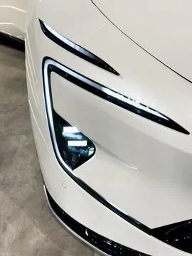 Car Front Full Led Light. Modern car headlamp flashing light. Switched on led Stock Photos