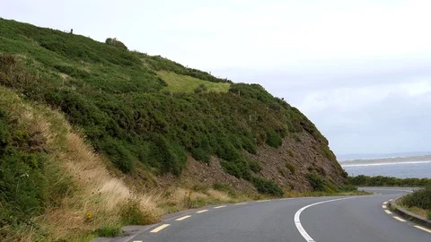 Car front view driving coastal road in Ireland 動画素材 129722466