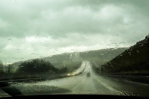 Car front window view during rain Stock Photos