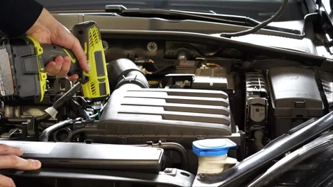 Car in the garage showing its engine and components while the camera is panning 스톡 동영상 268355618