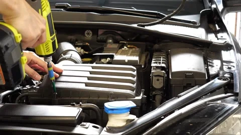 Car in the garage showing its engine and components while the camera is panning 스톡 동영상 268355883