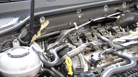 Car in the garage showing its engine and components while the camera is panning 스톡 동영상 268355970