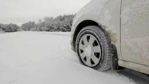 Car Getting Out From The Big Snowdrift Stock Footage 124599647