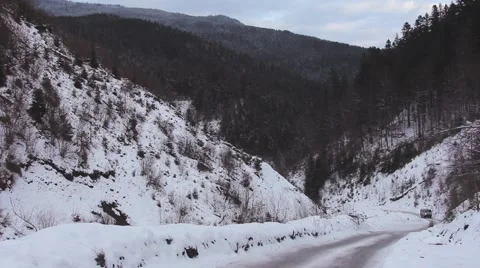 Car goes on the road in the mountains Stock Footage 59159132