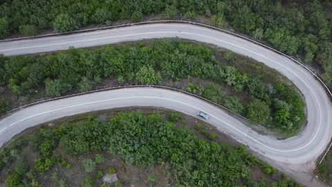 The car goes on a serpentine Stock Footage 231024384