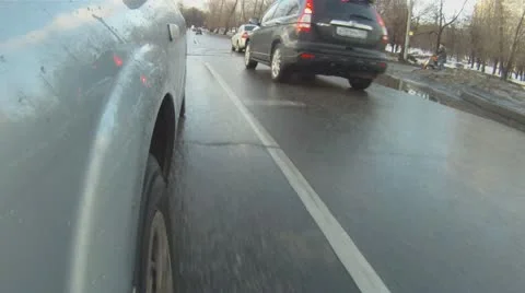Car goes through the puddles time lapse Stock Footage 12134590