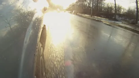 Car goes through the puddles time lapse Stock Footage 12134660