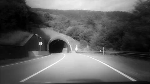 The car goes through a tunnel Vídeos de archivo 24590171