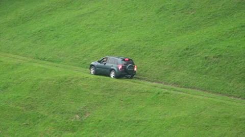 Car going backwards on dangerous mountain road Stock Footage 48980783