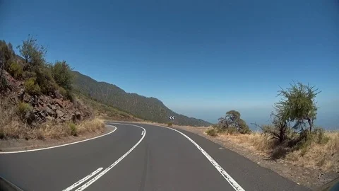Car going fast on a mountain road Stock Footage 72178102
