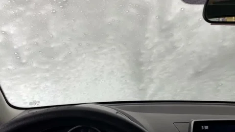 Car going through automatic tunnel wash Stock Footage 202524954