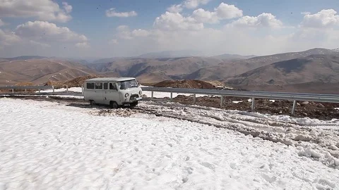 The car got stuck in the snow (mountains) Stock Footage 83746044