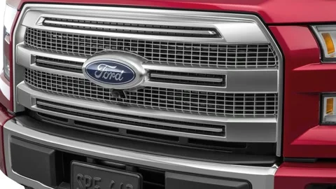 Car grille close up Ruby Red Tinted Clearcoat 2016 Ford F-150 Platinum Stock Footage 159866641