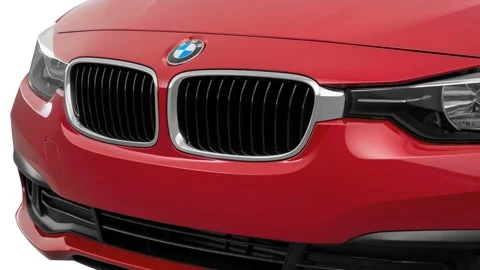Car grille with emblem close up Melbourne Red Metallic 2016 BMW 3-series 320i Stock Footage 159853560