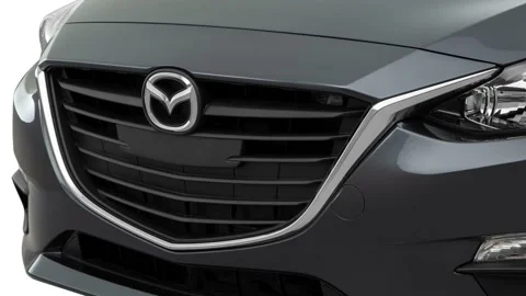 Car grille with emblem close up Meteor Gray Mica 2016 Mazda MAZDA3 i Sport Stock Footage 159855320