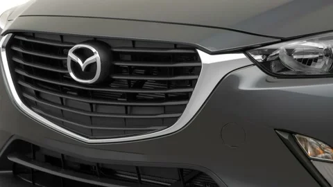 Car grille with emblem close up Meteor Gray Mica 2017 Mazda CX-3 Touring Stock Footage 159910743