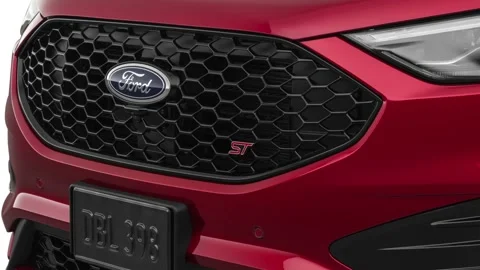 Car grille with emblem close up Ruby 2019 Ford Edge ST Stock Footage 160042237