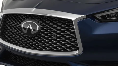 Car grille with emblem close up Solid Red 2020 Infiniti Q60 Red Sport 400 coupe Stock Footage 160102321