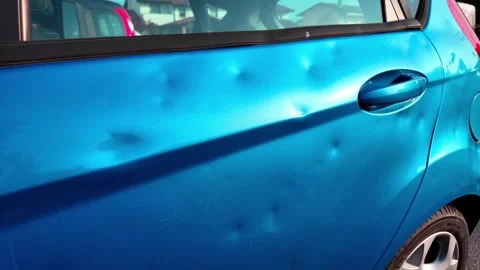 Car hail damage to car bodywork Stock Footage 325520080