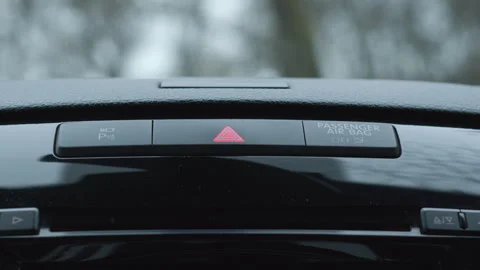 Car hazard warning button blinking with emergency flasher sound in modern 스톡 동영상 323413235