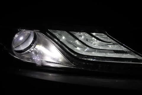 Car head light in the dark Stock Photos
