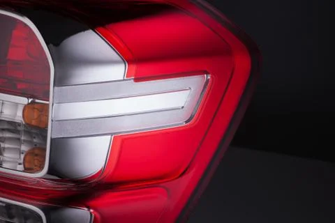 A car headlight on a black background Stock Photos