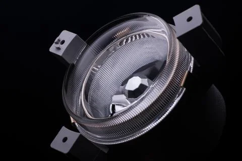 A car headlight on a black background Stock Photos