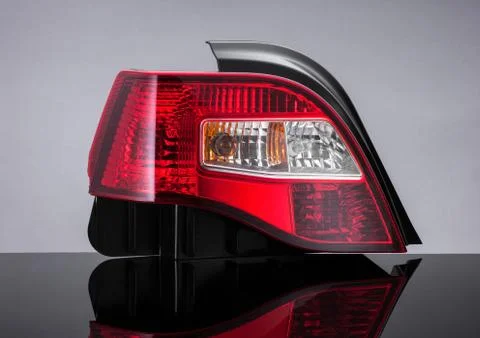 A car headlight on a black background Stock Photos