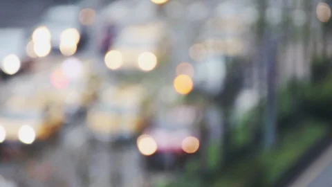 Car headlight bokeh passing through a busy intersection in Taipei CIty Video stock 107035899