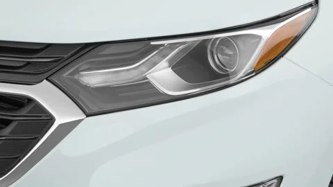 Car headlight close up Black 2018 Chevrolet Equinox LT Stock Footage 159940087