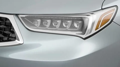 Car headlight close up Burnished Copper 2018 Acura TLX 2.4 8-DCT P-AWS Stock Footage 159951517