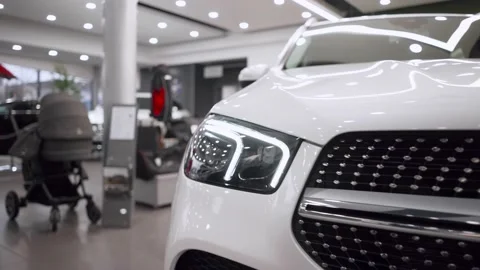 Car with Headlight Close up. Car Front Led Light with a Blurry Background and a Stock Footage 163080077