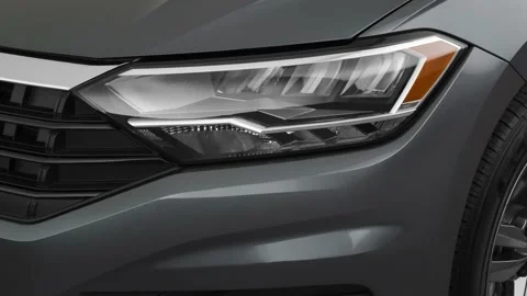 Car headlight close up Crystal White Tricoat 2019 Volkswagen Jetta 1.4T R-Line Stock Footage 160026711