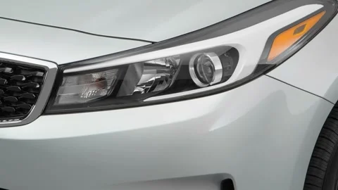 Car headlight close up Grigio Argento 2017 Kia Forte LX Stock Footage 159906208