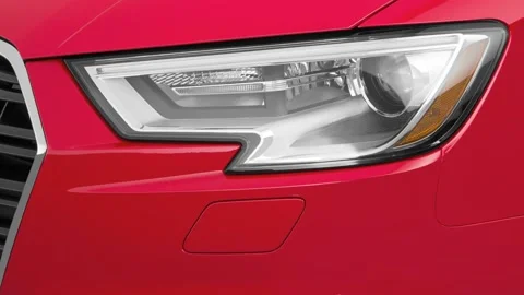 Car headlight close up Ingot Silver 2017 Audi A3 Premium 2.0 TFSI Stock Footage 159922138